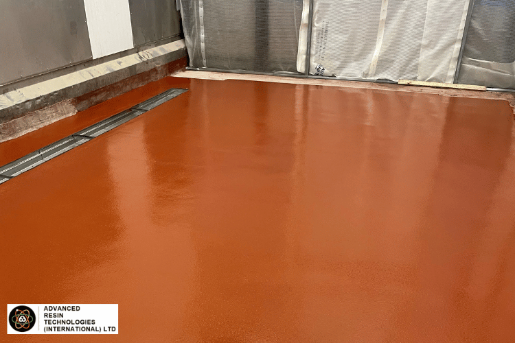The inside of a food factory that is going to pass its BRC audit due to having a new resin floor installed that is durable and easy to keep clean