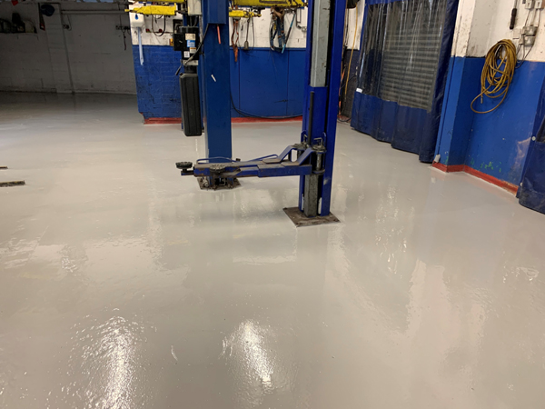 Removing Failed Flooring & Fixing It With Heavy Oil Tolerant Primer And Our High Build Durable Epoxy Top Coat For Mercury Cars